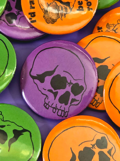 skull button in purple