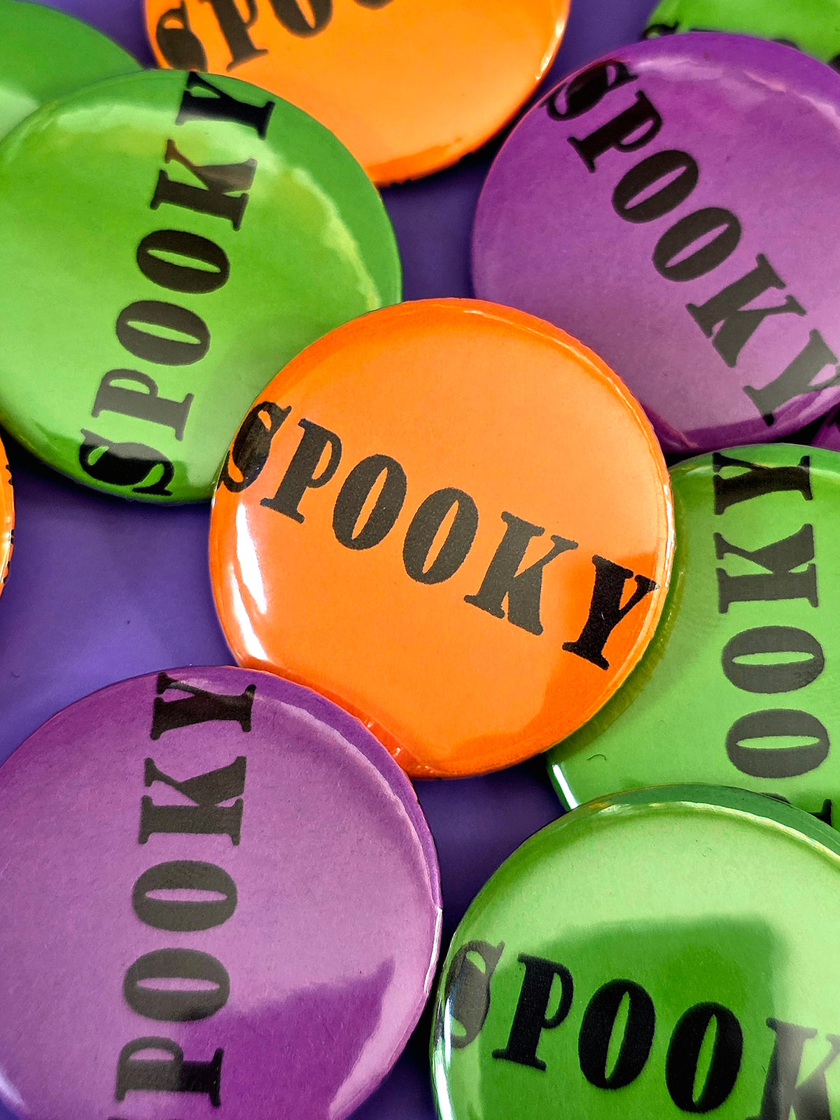an orange button that says spooky