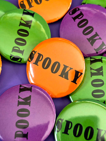 an orange button that says spooky