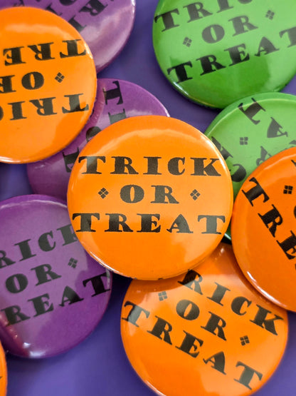 an orange button that that says "trick or treat"